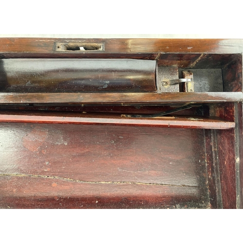 1386 - A Victorian Cherry wood writing box with brass banding, escutcheon & corners. Interior faux leather ... 