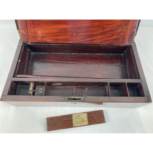 1386 - A Victorian Cherry wood writing box with brass banding, escutcheon & corners. Interior faux leather ... 