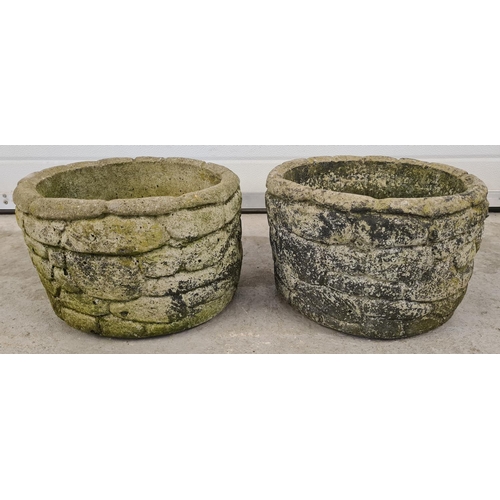 1423 - 2 vintage concrete garden planters with brick effect design. Approx. 21cm tall x 32 diameter.