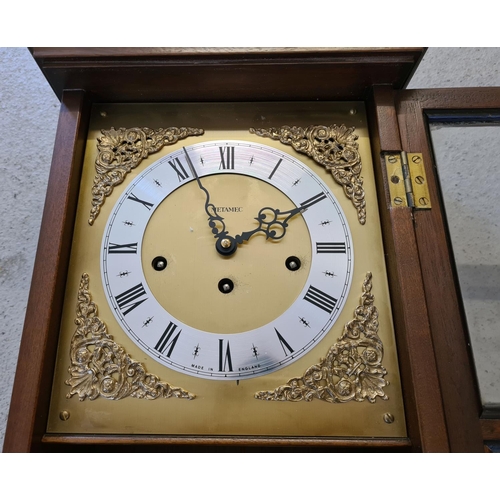 1258 - A vintage wooden cased Metamec Westminster chiming, 8 day weight driven wall clock. Complete with pe... 