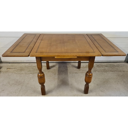 1492 - A vintage mid century dark wood drawer leaf dining table and 4 chairs. Chunky acorn design table leg... 