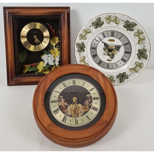 1260 - 3 vintage Metamec quartz wall hanging clocks. 2 wooden cased clocks with floral detail together with... 