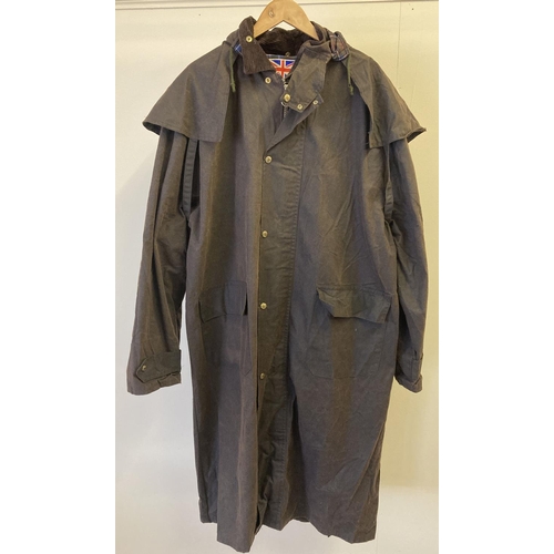 71 - A mens long brown wax coat with cape detail to shoulders and hood, by Blue Riband. Front zip and pre... 