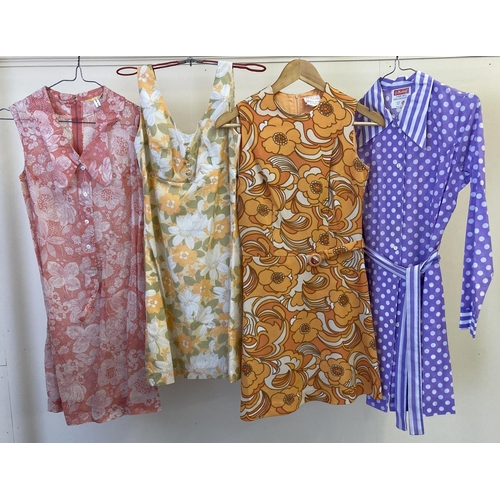 247 - 4 vintage 1960's day dresses. 3 sleeveless dresses in orange and coral shades, all with bold floral ... 