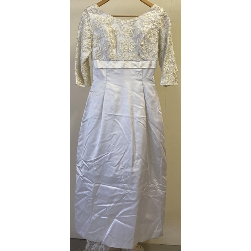 263 - A vintage 1960's white satin & lace wedding dress with detachable lace train.