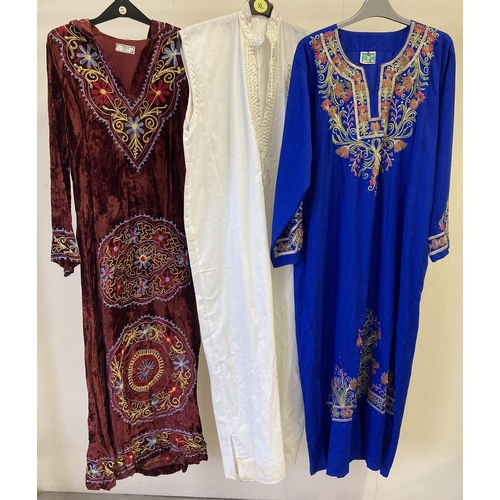 268 - 3 vintage ethnic style tunics with embroidered detail. To include red velour hooded tunic and white ... 