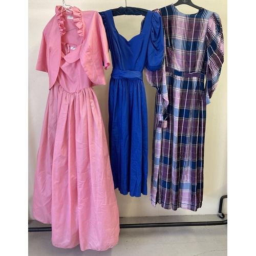 279 - 3 vintage 1980's dresses. To include a navy blue Laura Ashley dress and bright spaghetti strapped pi... 