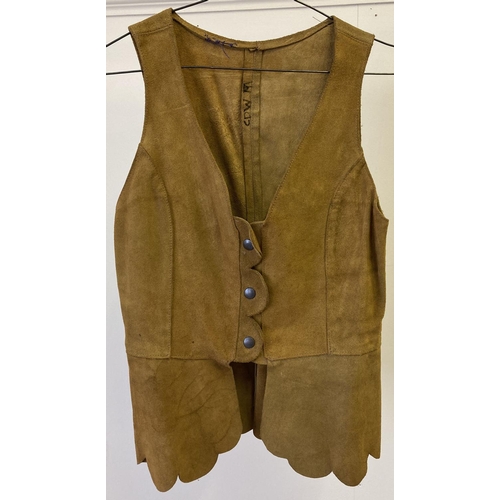 290 - A vintage 1960's tan coloured suede waistcoat with scalloped detail and press stud fastening.