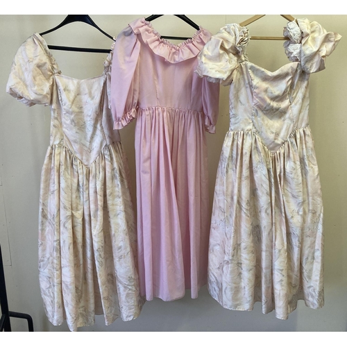 298 - 3 vintage 1980's bridesmaids dresses in peach and pink tones. 2 matching drop waist dresses with puf... 