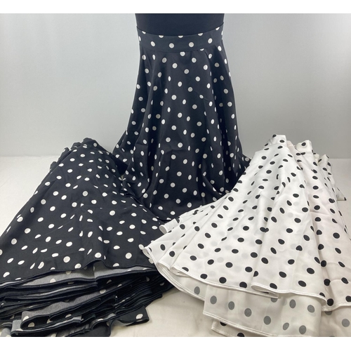 82 - 16 assorted theatre costume polka dot design swing skirts, in black & white.