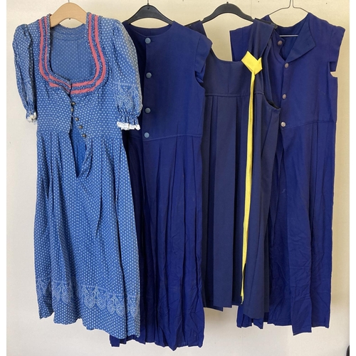 92 - 4 vintage theatre costume short sleeved day dresses, in blue tones.