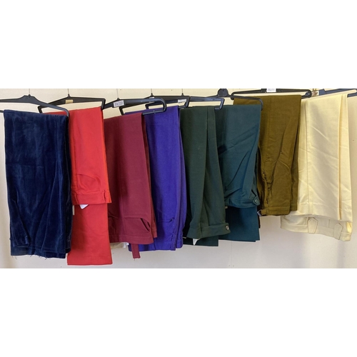 314 - 8 vintage pairs of men's brightly coloured trousers in varying materials and sizes.