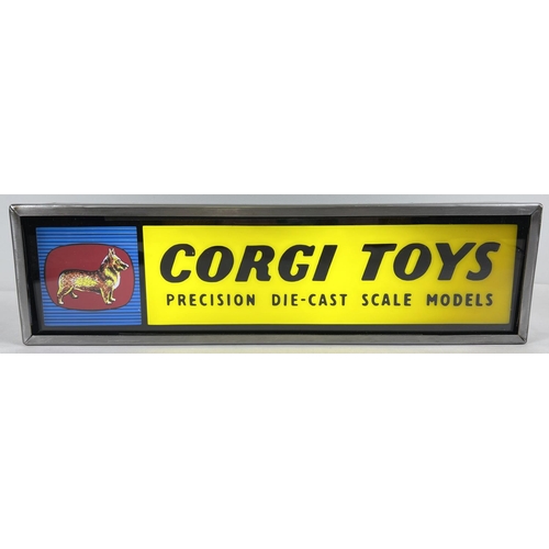 287 - A vintage glass fronted Corgi Toys illuminating shop display sign. Sign reads 