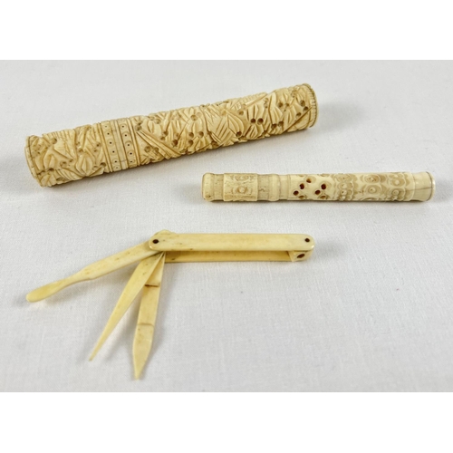 1277 - 2 antique ivory highly carved needle cases together with a pocket manicure/vanity tool. Largest case... 