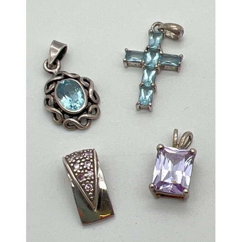 1068 - 4 stone set silver pendants, all marked 925 to reverse or bale. Largest approx. 3cm long.