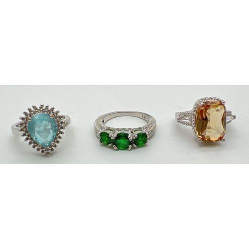 1072 - 3 modern coloured stone set dress rings, all stamped 925. Ring sizes N & J½.