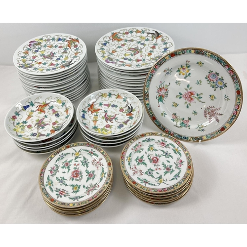 1261 - A large quantity of Chinese ceramic dinner ware with handpainted floral & butterfly design. Comprisi... 