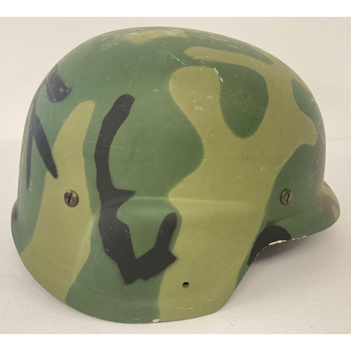 105 - US prototype Personnel Armor System Ground Troops (PASGT) helmet, believed to be made from GRP. Helm... 