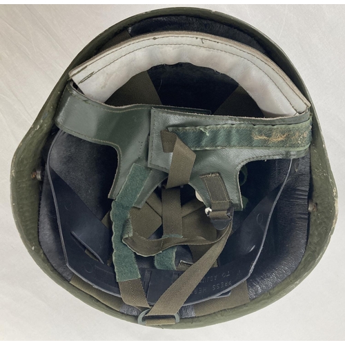 253 - A British Northern Ireland pattern Combat helmet made of GRP by Thetford Moulded Products Ltd. 1971-... 