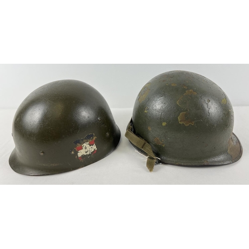 18 - A WWII US M1 steel helmet (c1944-45), rear seam, as used in the Korean & Vietnam War. Two bullet str... 