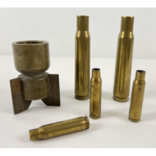 21 - A collection of small brass shell cases to include WWII era. Largest approx. 10cm long.