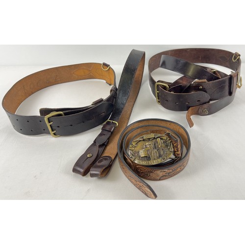 39 - 2 brown leather Sam Browne belts with shoulder straps together with 1 other leather belt. With brass... 