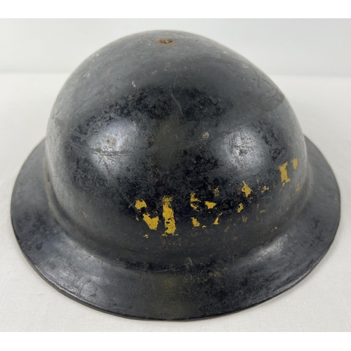 48 - A WWII British Bakelite helmet either Home Front use or Royal Navy. Front labelled MSMH, possibly fo... 