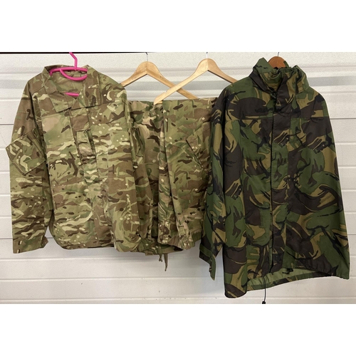 51 - 4 items of camouflage clothing. A combat jacket, temperate weather MTP (size 170/112) & 2 pairs of m... 