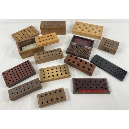 57 - 14 assorted wooden .22 and .45 cal loading blocks.