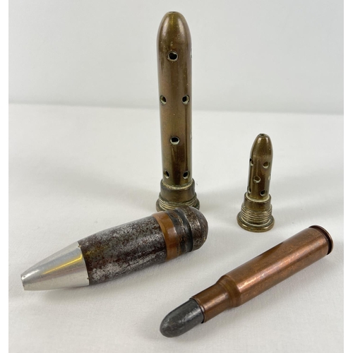 97 - A small collection of vintage military brass and copper  shell cases. To include RG 83 and K 76 L12A... 
