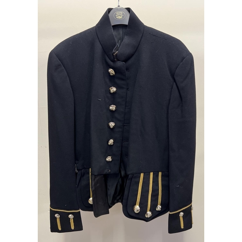 104 - A fully lined military dress short coat with bullion thread detail and flaming grenade design button... 