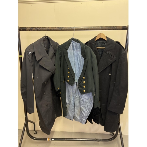 118 - 3 Constabulary coats. A Metropolitan Police rain coat, a green dress tails jacket and an over coat, ... 