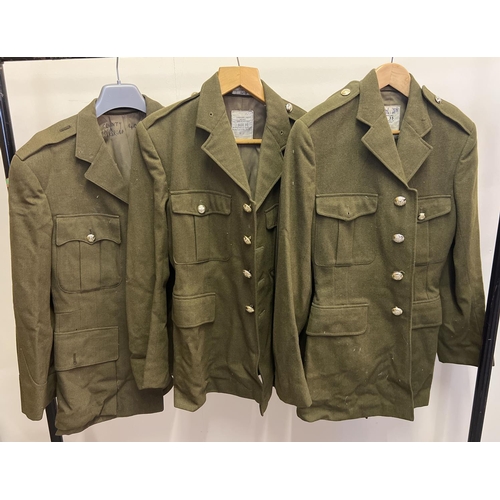 129 - 3 vintage British Army jackets with a variety of assorted military buttons. To include Kings Regimen... 