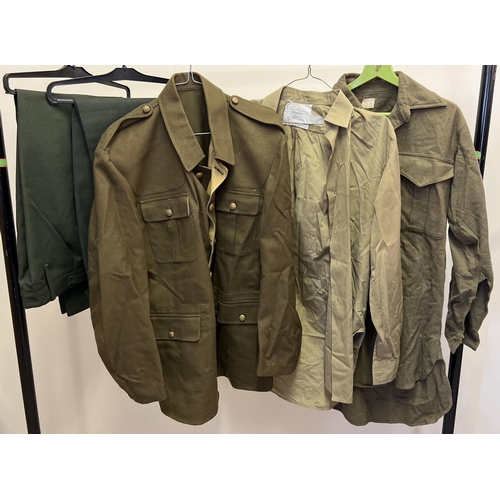 151 - 5 vintage items of British Army uniform. A jacket with brass buttons, 2 pairs of barrack trousers an... 