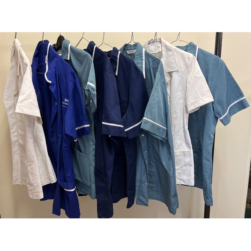 166 - 8 assorted nursing, care and medical staff tunic tops.