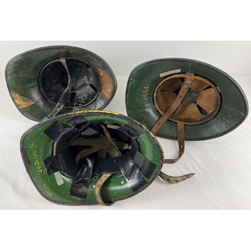 189 - 3 vintage Fire Service helmets, 2 by Helmets Limited with leather liners and straps and remnants of ... 