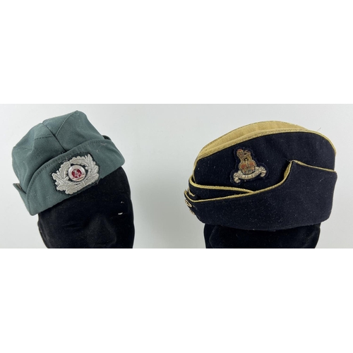 198 - 2 vintage military side caps with badges. A green canvas Cold War style Volkspolizei cap with badge ... 