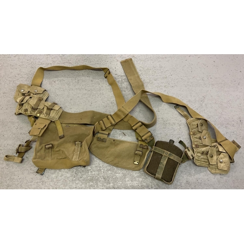 208 - A quantity of WWII era tan coloured canvas webbing, with bag, pouches and water bottle. Stamped with... 