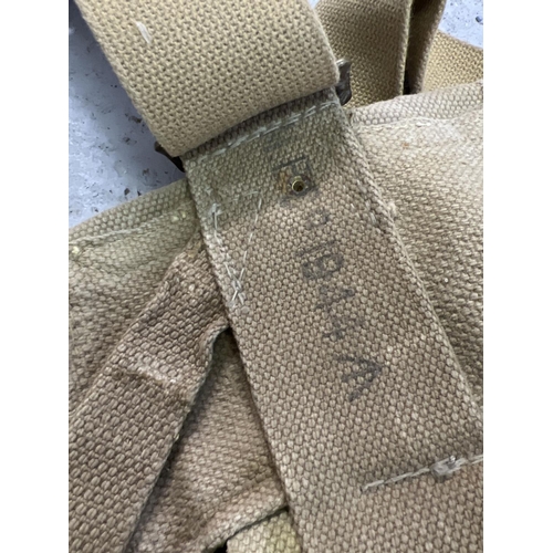 208 - A quantity of WWII era tan coloured canvas webbing, with bag, pouches and water bottle. Stamped with... 