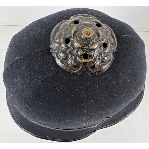 215 - A vintage Police Custodian helmet with leather strap and interior.