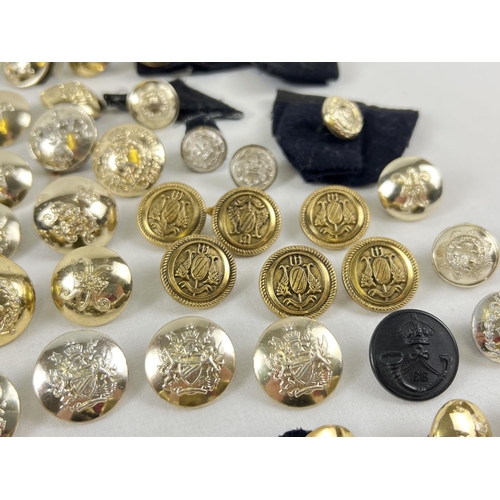 244 - A collection of 60 assorted military buttons to include examples by Gaunt and Firmin.