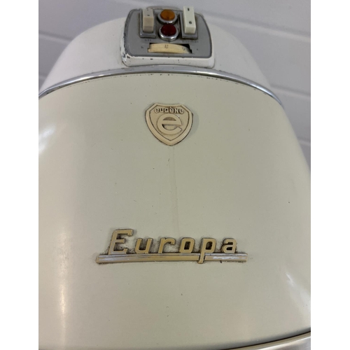 1238 - A vintage 1960's floor standing adjustable height Europa hairdryer by Eugene. On wheeled feet.