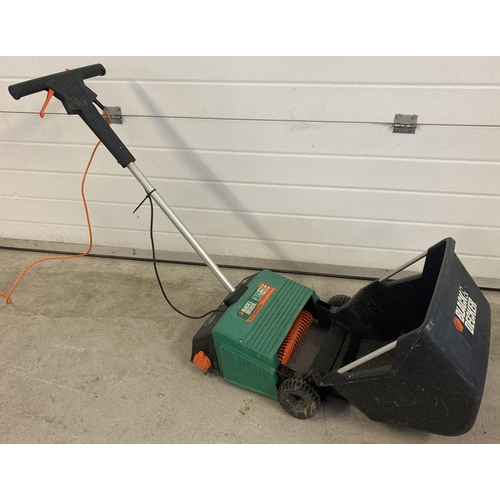 1290 - An electric 3 in 1 Black and Decker garden GD200 Lawnraker 30cm. Not tried & tested.