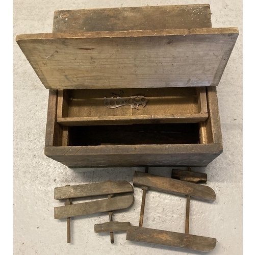 1291 - A vintage pine tool box with interior draw together with wooden clamps.