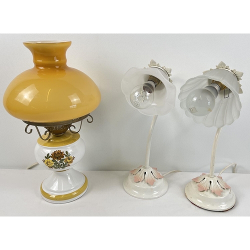 1297 - 3 vintage table lamps to include a pair of metal based bedside lamps of floral design with glass sha... 