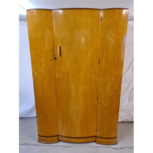 1299 - An Art Deco birds eye maple veneer bow fronted 4 piece bedroom suite. With inlaid banded detail and ... 