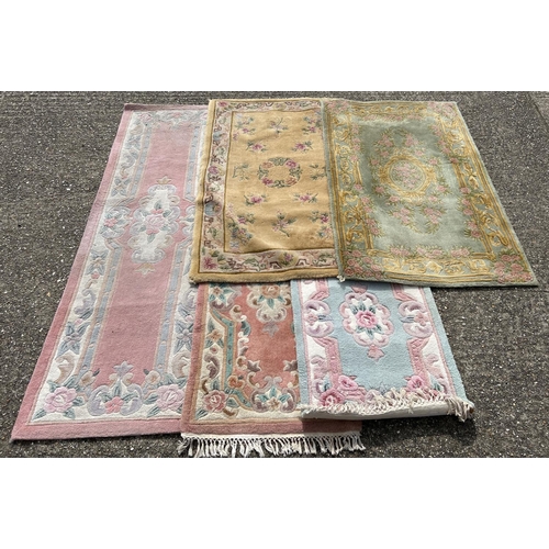 1301 - 5 Chinese style rugs with floral detail, in varying colours and sizes. To include pink ground runner... 