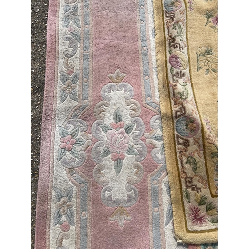 1301 - 5 Chinese style rugs with floral detail, in varying colours and sizes. To include pink ground runner... 