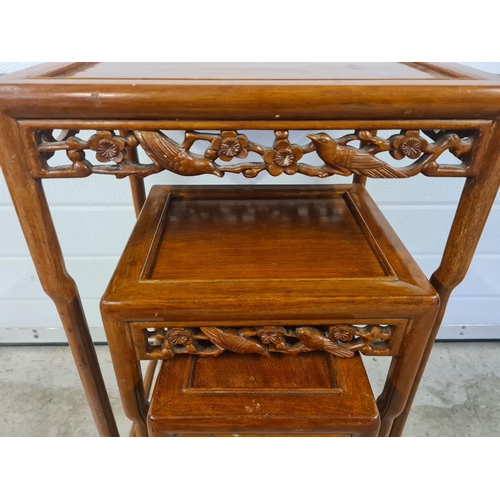 1311 - A set of 3 Oriental carved nesting tables with shaped legs and cherry blossom and bird pierced work ... 