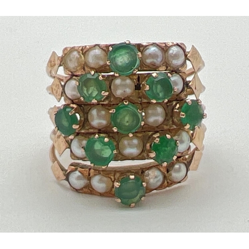 1053 - A vintage gold, emerald and seed pearl harem ring. Ring consists of 5 small bands each set with smal... 